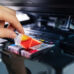 office equipment maintenance and service hand replace inkjet printer cartridge